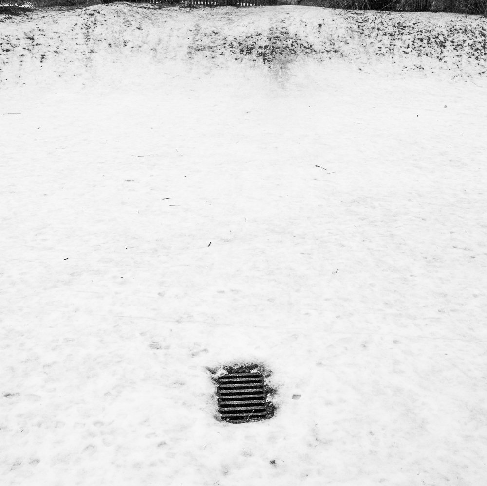Adam Mazek Photography Warsaw square 2016. Sewerage. Snow. Minimalism.