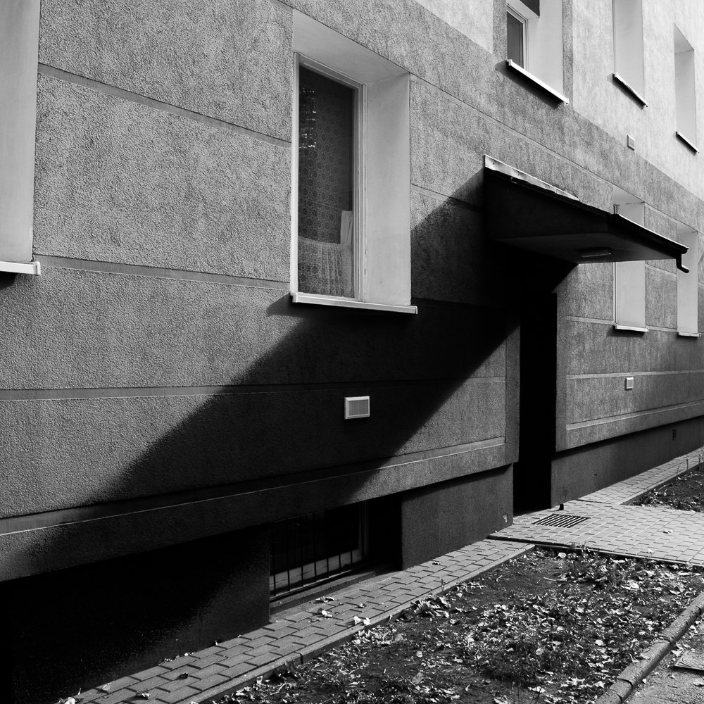 Adam Mazek Photography "Back to the past" Warsaw 2016. Long shadow. Concrete. Square. Mokotow.