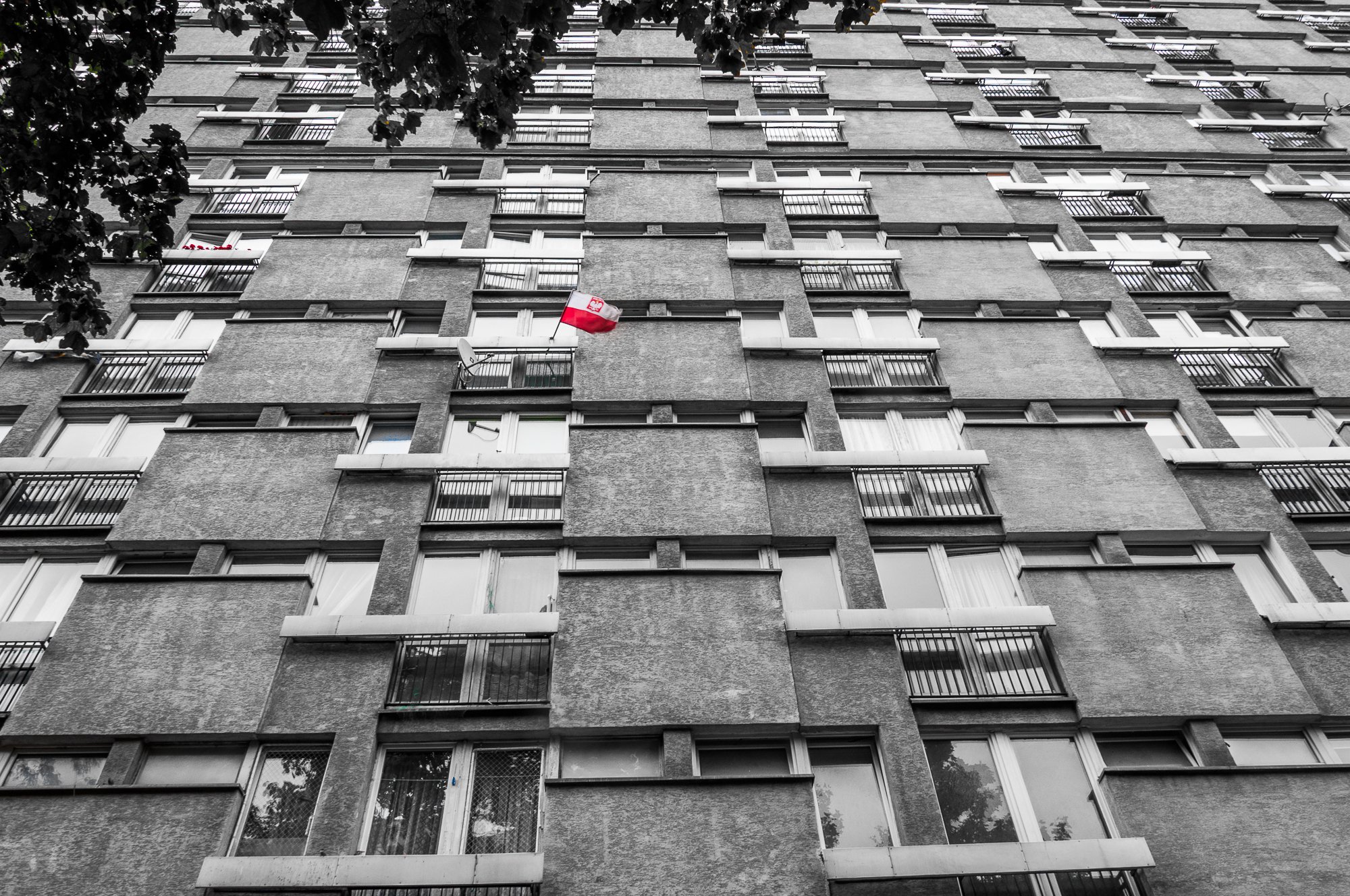Adam Mazek Photography Warsaw 2017. Minimalism. Inspired by Poland. Flag of Poland in the window.