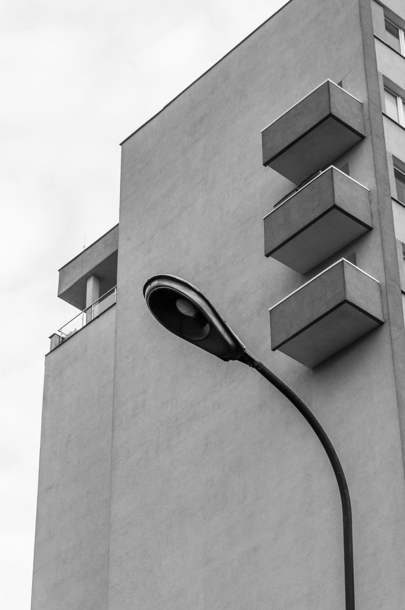 Adam Mazek Photography Warsaw 2018. Minimalism. Memory. Street lamp and balconies.