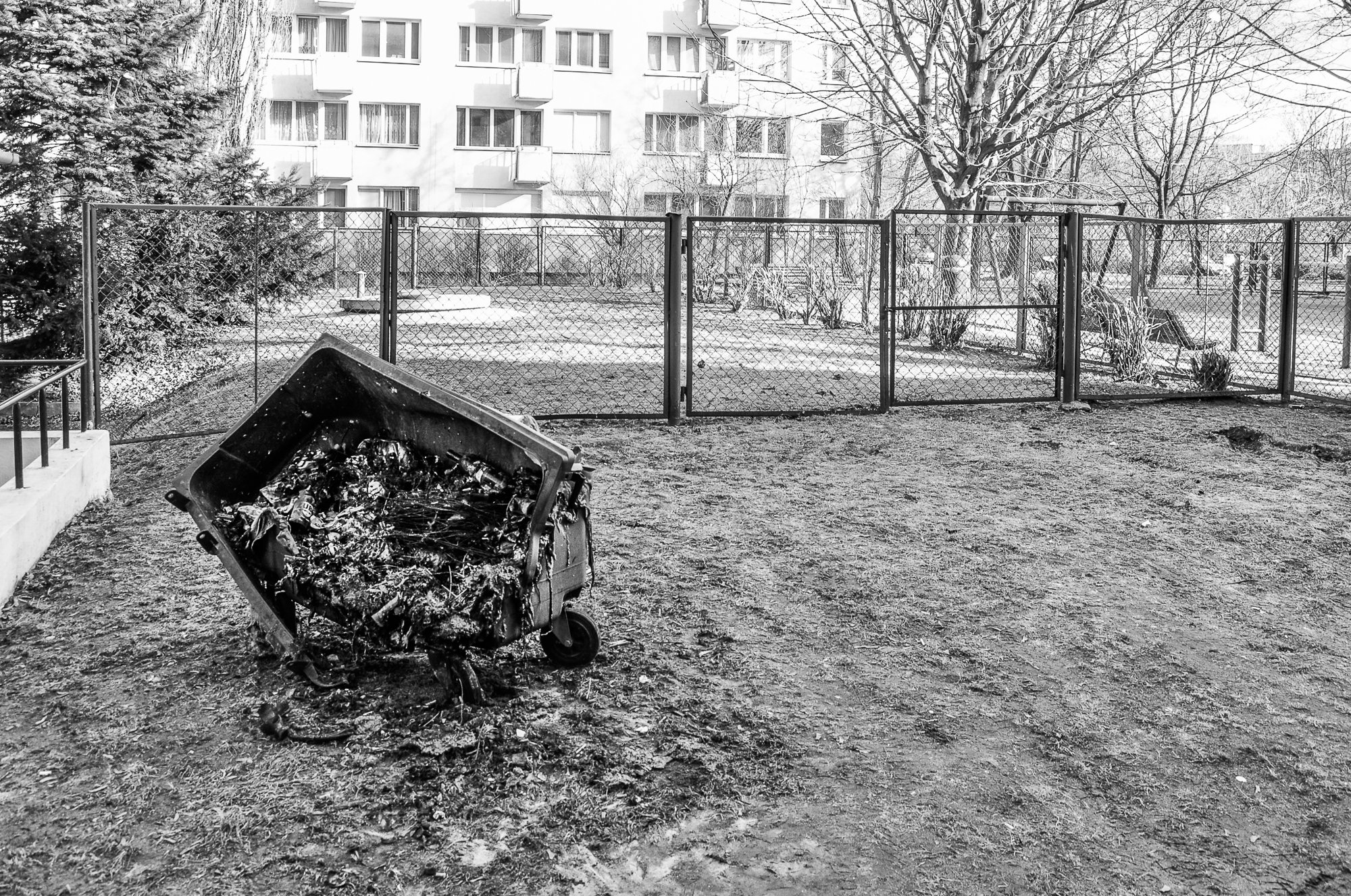 Adam Mazek Photography Warsaw (Warszawa) 2012. Post: "Wandering through the streets." Minimalism. Burnt bin.