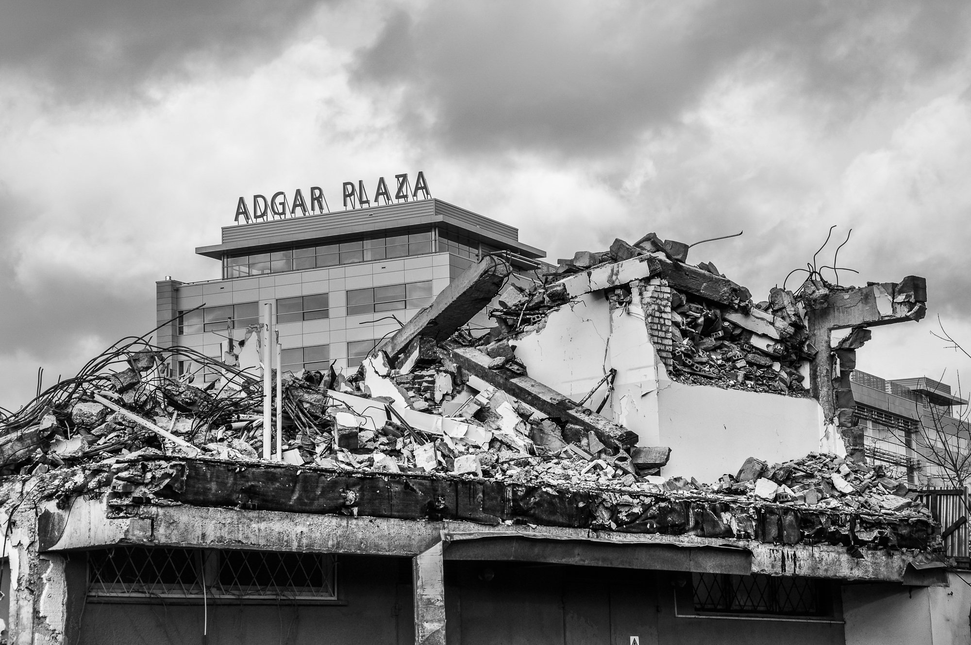 Adam Mazek Photography Warsaw (Warszawa) 2012. Post: "Wandering through the streets." Adgar Plaza and destroyed building. Minimalism.