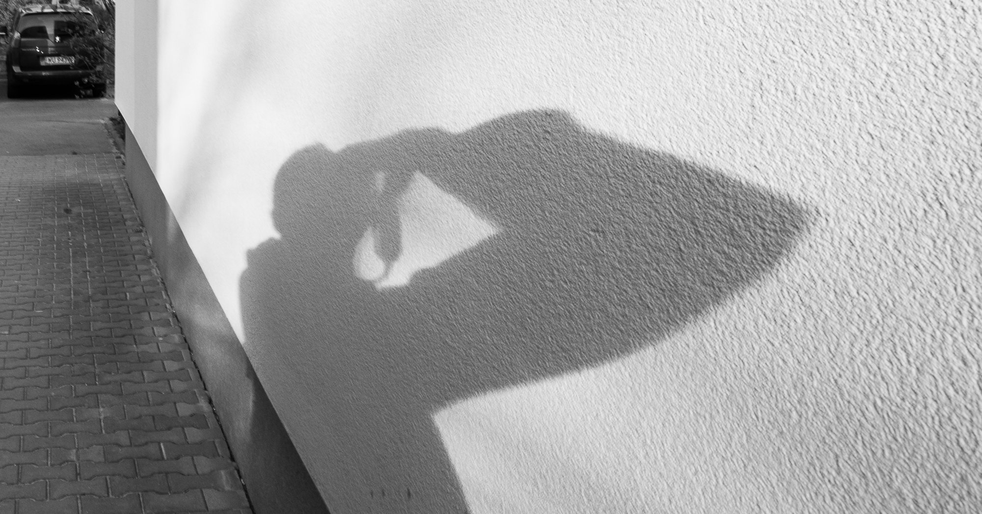 Adam Mazek Photography Warsaw (Warszawa) 2019. Post: "Escape." Minimalism. Shadow Selfie. Geometry. Featured image.
