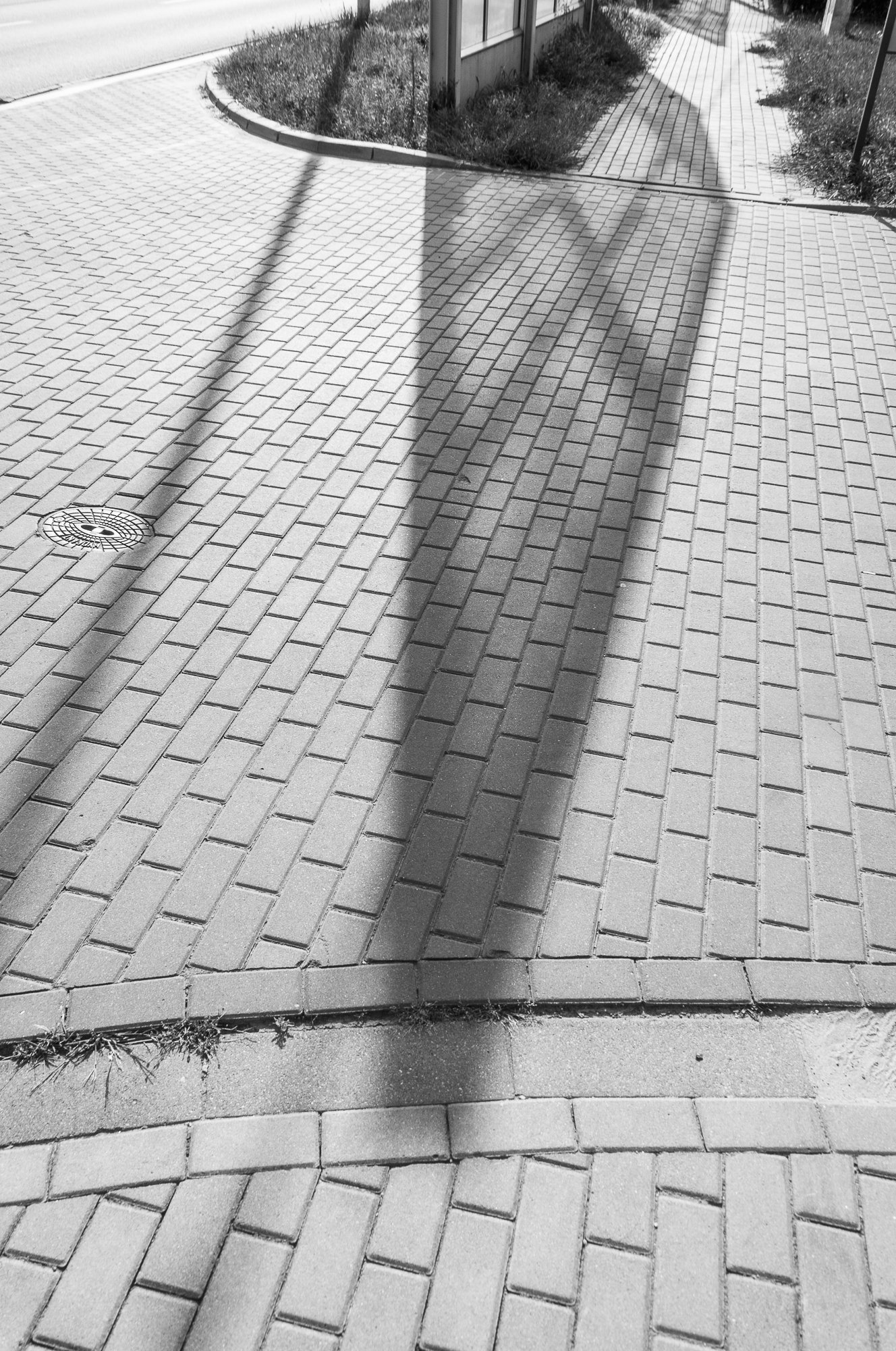Adam Mazek Photography 2021. Warsaw Street Photography. Post: "What do I believe in?” Geometry. Shadow.